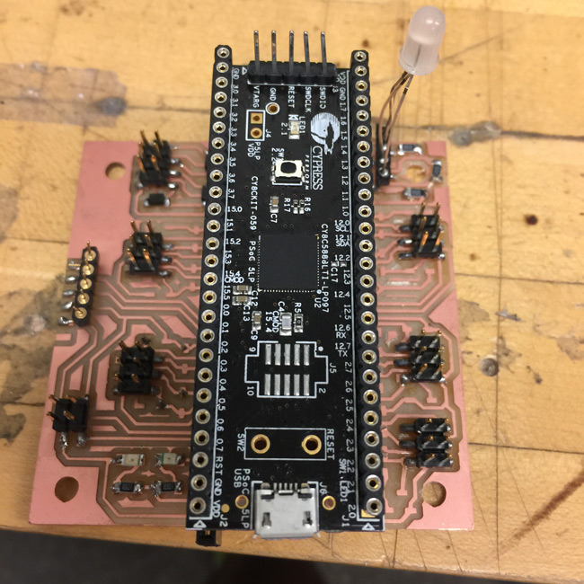 A single Cypress PSoC 5LP was used in each cube and attached via mountings to the circuit board.